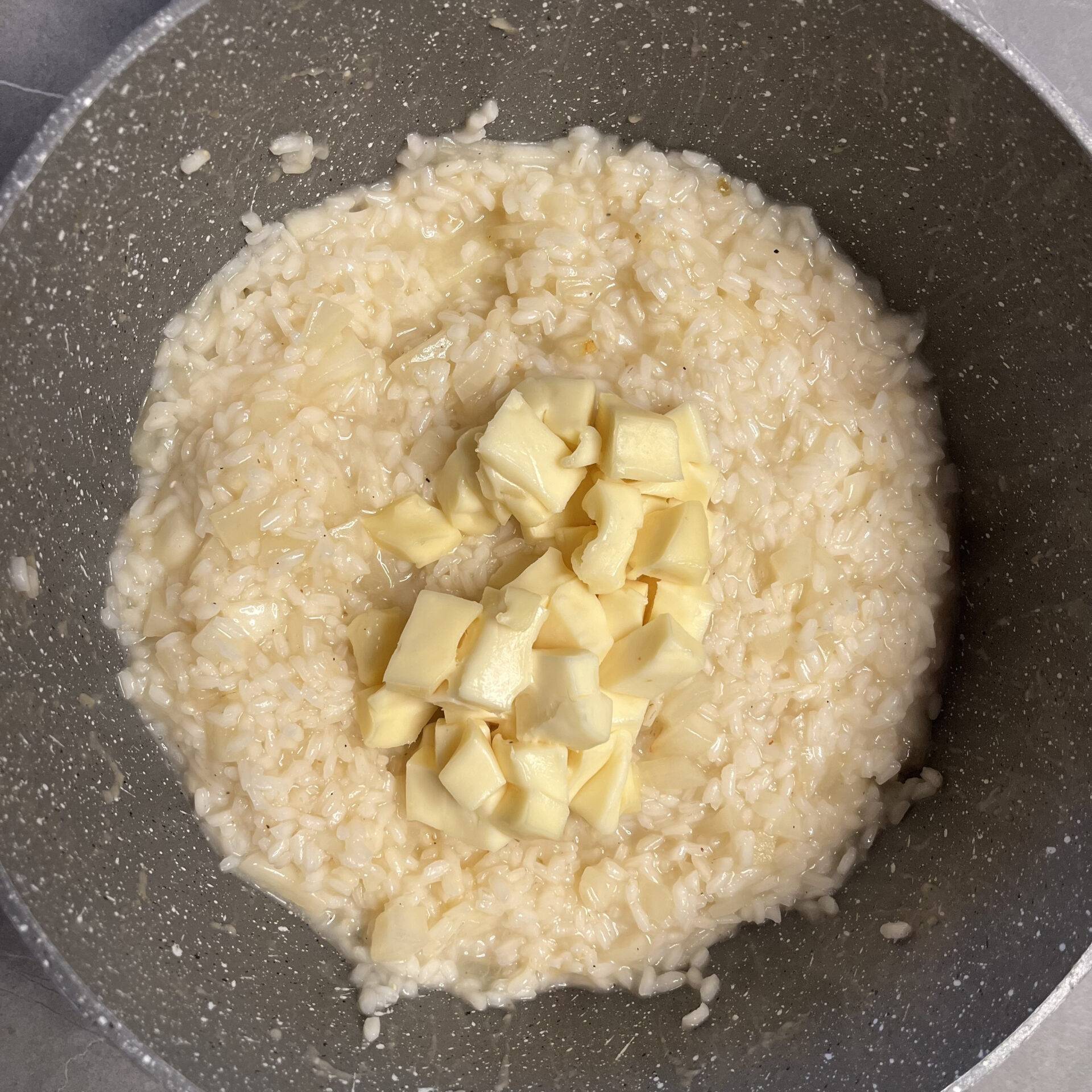 AGGIUNTA TALEGGIO AL RISOTTO